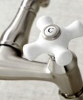 Close-up of Old School Vintage Style Wall Mount Kitchen Faucet In Brushed Nickel, Swivel Victorian Spout with ceramic handle