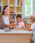 Family using Magnetic Bingo Wands Set 12 Colorful Sticks 7.87 Inch Long Magnetic Tips for fun educational activities.