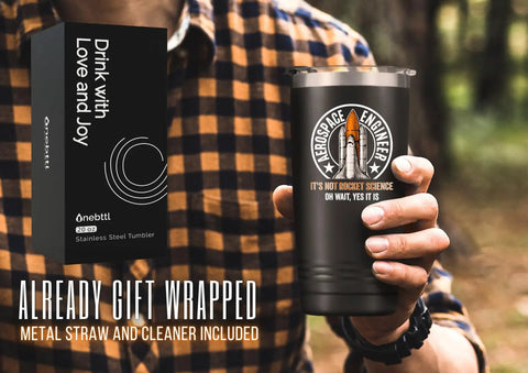 Man holding Space Themed 20oz Stainless Steel Tumbler With Lid, Double Wall Vacuum Insulated Travel Coffee Mug For Men, Hilarious It's Not Rocket Science Oh Wait Yes It Is Quote With Rocket Launch Logo Gift outside.