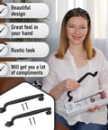 Woman holding Two Pack 12 Inch Diamond Tapered Barn Door Handles Black Cast Iron Pulls For Sliding Doors Gates Sheds Fences Closets