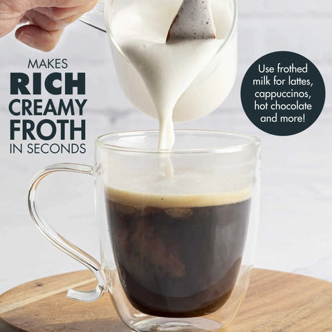 Handheld electric milk frother pouring rich creamy froth into espresso cup from Compact Stovetop Espresso Maker And Handheld Electric Milk Frother Gift Set Pro Grade Aluminum Moka Pot For Rich Italian Cuban Coffee Six Sleek Demitasse Cups For Next Level Daily Grind Sips.