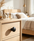 Knockout Matte Black Bifold Closet Door Knobs Featuring Round Cabinet Pulls Durable Aluminum Alloy Build Complete Install Pack With Screws And Driver For Total Breeze Dresser Updates on wooden nightstand.
