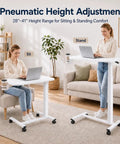 Smooth Operator Mobile Rolling Desk With Lockable Casters And Pneumatic Height Adjustment From Twenty Eight To Forty One Inches with a woman sitting and standing.