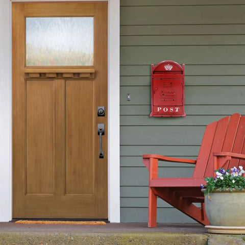 Vintage Rustic Wall Mounted Post Box Mailbox In Iron With Powder Coated Red Finish by door, outdoor setting