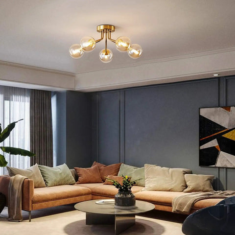 Living room with Gold Five Light Sputnik Style Ceiling Light Semi Flush Mount With Glass Globe Pendant Lamps