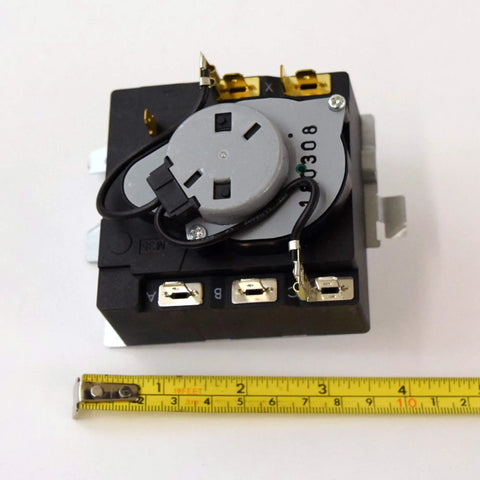 Dryer Timer WE04X25280 Genuine Replacement Part For Dryers with visible wiring and ruler for scale.