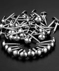 Kick Your Home Decor Up A Notch With These Legit Tough Vintage Silver Upholstery Nails 100 Piece Zinc Alloy Furniture Tacks scattered on a dark surface.