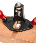 Tough As Nails Handheld Router Plane Featuring Adjustable Stainless Steel And Ebony Blades on wood surface for precise edge trimming.