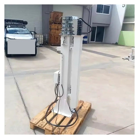 Rock Solid Electric Hydraulic Telescopic Mast 4 To 12 Meters aluminum pole on a wooden pallet, for tough job site use.