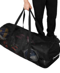 Person carrying XL Mesh Dive Bag For Scuba And Snorkel Gear, Heavy Duty Travel Duffle With Waterproof Pocket, Fits Mask, Fins, Snorkel