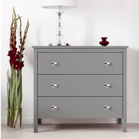 Oval Shape Polished Nickel Cabinet Drawer Knobs Set on a gray dresser, featuring Solid Brass Dresser Drawer Pulls.
