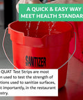 Red sanitizer bucket showing Quat Sanitizer Test Strips 100 Pack for Quaternary Sanitizing Solutions 0 to 500 Ppm in use
