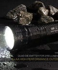 EA81 Cree XHP50 Powerhouse AA Searchlight Flashlight With 2150 Lumens And 462m Throw, Rugged Black Finish, Wet Outdoor Scene