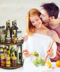 Rotating Spice Rack Two Tier Lazy Susan Organizer with bottles and jars on kitchen counter, couple preparing salad nearby