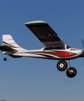 RC Airplane Apprentice STOL S 700 RTF With AS3X SAFE Technology in flight against blue sky