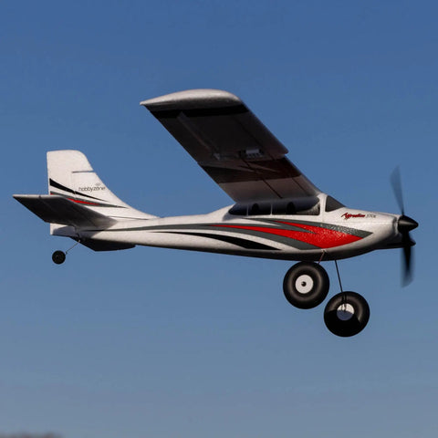 RC Airplane Apprentice STOL S 700 RTF With AS3X SAFE Technology in flight against blue sky