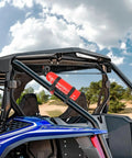 Heavy Duty Aluminum Fire Extinguisher Mount Bracket With Quick Release For 1.75 To 2 Inch Roll Bars on ATV in Off-Road Setting