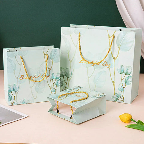 Blue Paper Bags Set 30 Pack Premium 3D Cut Tote Bags with floral design, 10 each size, suitable for shopping and gift wrapping.