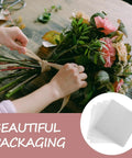 50 Sheets White Solid Color Folding Tissue Paper for Flower Wrapping and Florist Packaging shown with bouquet being wrapped
