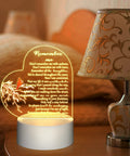 Heart Shaped Memorial Night Light With Clear Crystal Acrylic Base LED Remembrance Sign For Loss Of A Loved One Heartfelt Condolence Gift Red Cardinal Bird Style Keepsake glowing on bedside table