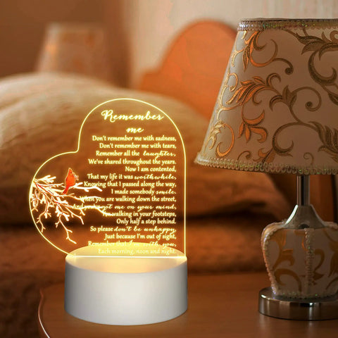 Heart Shaped Memorial Night Light With Clear Crystal Acrylic Base LED Remembrance Sign For Loss Of A Loved One Heartfelt Condolence Gift Red Cardinal Bird Style Keepsake glowing on bedside table
