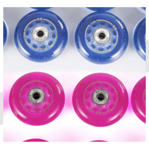 Pink Dope Inline Skate Wheels 64mm 85A With Bearings 8 Pack For Outdoor And Indoor Roller Blades Replacement Wheels Durable PU Set For A Smooth Ride Long Lasting Fun, shown in pink and blue from above