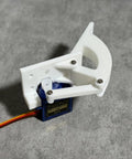 Servo Hinge Kit for SG90 Mini Servos, Hatch Door Mount, white plastic, 3.2x1 inches, mounted on a micro servo with screws