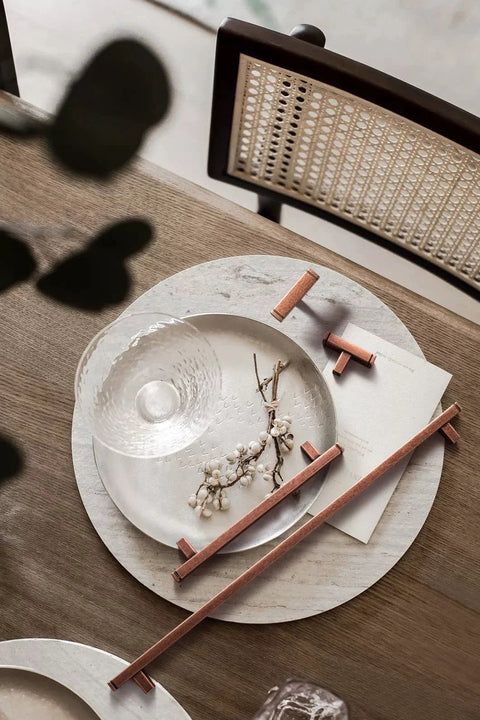 Six Pack 3 Inch Hole Center Antique Copper Zinc Alloy Cabinet Pulls on Tabletop with Dish Decor.