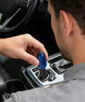 Plug-and-Play 12V Gas Saver Tool With Magnetic Tuning Tech For Cars Trucks And Diesel Engines being installed in car outlet