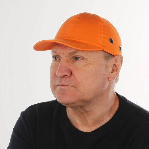Person wearing Five Pack Reflective Bump Cap Hard Hat With Breathable Lightweight Safety Cap For Men And Women Adjustable Size With Hook And Loop Twill Neon Orange High Visibility