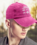 Funny Spare Time RV Camper Hat For Women In Distressed Washed Pomegranate Red on person outdoors, side view