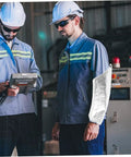 Heavy Duty Aluminum Foil High Heat Resistant Arm Sleeves Sweat Free Adjustable Breathable Guard Shields For Mechanics Hot Shop Work Lab Safety And Backyard Grills worn by a worker in a safety environment.
