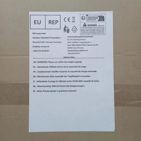 Heavy Duty Platform Hand Truck Featuring 360 Degree Swivel Wheels And Adjustable Safety Rail safety warning label on cardboard.