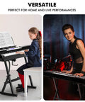 Heavy Duty Z Frame Keyboard Stand With Foam Padded Arms Adjustable Height And Width Fits 54 To 88 Key Electric Pianos in use.