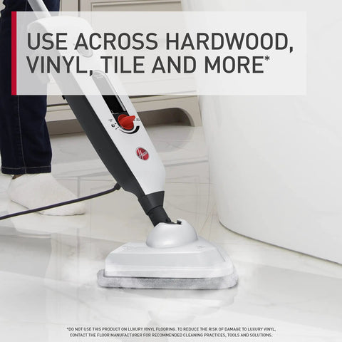 Kick Up Some Serious Grime And Nail The Clean Every Single Time Ditching Harsh Chemicals With This Reliable Multipurpose Steam Mop For Slick Hardwood And Tile Floors in use on tiled floor.
