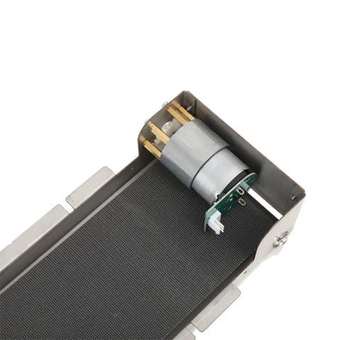 Close-up of Stainless Steel Desktop Conveyor Belt System For Small Assembly Lines 460Mm X 85Mm 3.5 To 5 Kg Load Copper Motor 110V 220V With Power 35 RPM highlighting motor and belt.