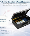 Open Fireproof Document Safe Box With Key Lock Water And Fire Resistant Storage Chest, showing passports, jewelry and documents inside.