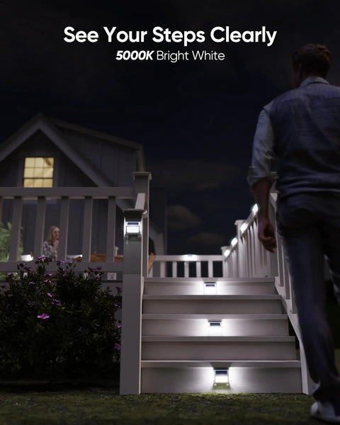 16 Pack 3 Sided Solar Deck Lights Stainless Steel Waterproof IP65 Outdoor Lights illuminating garden steps at night.