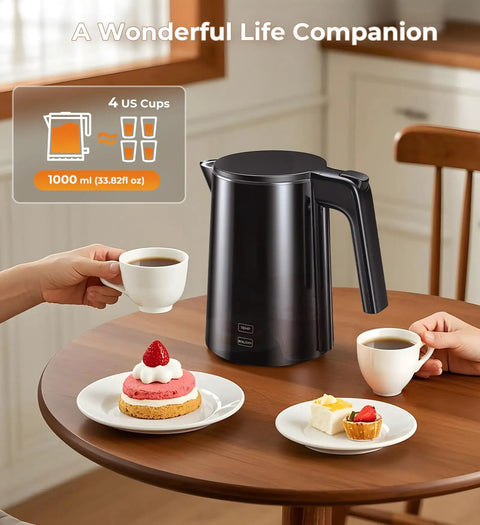 Fast Boil Electric Kettle 1.0L 1200W With 7 Temperature Settings 4 Hour Keep Warm Auto Shut Off Cool Touch Stainless Steel 120V Water Boiler For Home Office Black on a kitchen table with coffee cups and pastries.