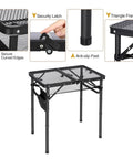 Small Folding Grill Table For Outdoors With Three Adjustable Heights Lightweight Portable Aluminum Camp Table For Camping Picnics BBQ Black 24 By 16 Inches with secure curved edges, security latch, anti-slip feet, and triangle frame design.