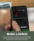 Person using Pin Moisture Meter For Wood And Walls, Easy DIY Humidity Detector For Home Construction, Lumber, Firewood, And Wood Moldings, Probes Reach Seven Sixteenths Of An Inch, Ideal For Hobbyist Woodworkers, Durable, Reliable, And Simple To Use on wooden surface