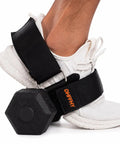 Close-up of Dumbbell Foot Attachment for Glute Kickbacks and Hamstring Curls with Adjustable Ankle Strap in use on white sneaker