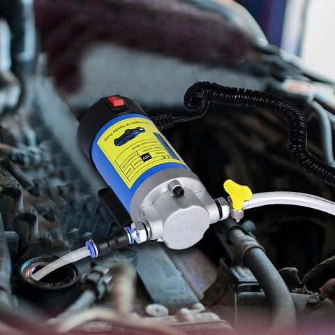 Smooth 12V Oil Extractor Pump For Quick Engine Oil Swaps With Self Priming Gear Mechanism and Suction Tubing in car engine bay.