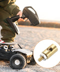 RC Hobbyist Linkage Stoppers Set With Nuts And Screws For Servo Arms And Push Rods, copper gold finish beside RC car on dirt