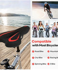 Gel Bike Seat For Men And Women With Waterproof Cover attached to a bike, by a waterfront, showing compatibility with multiple bike types.