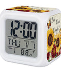 Total Game Changer Farmhouse Sunflower Butterfly Digital Cube Clock With Led Time Date Temp Readout showcasing time display and floral design.