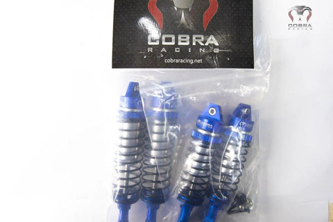 Packaged Blue Aluminum BigBore Shocks For 4x4 And 2WD Trucks And SUVs Front And Rear Adjustable High Performance Suspension