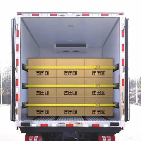 E Track Tie Down Rail Kit 31 Piece Set With Complete Heavy Duty Trailer Rig Hardware Includes Four 16 Inch Rails securing boxes in a trailer.