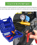 Grease Monkey Approved Single Handed Brake Bleeder Vacuum Pump Kit With Precision Gauge Adapters And Rugged Carry Case displayed with tools and accessories in blue carrying case.