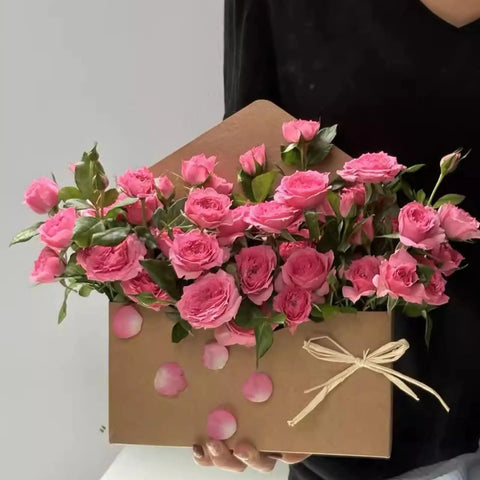 Five Pack Envelope Style Gift Boxes For Flowers And Crafting Parties with pink roses and tied ribbon